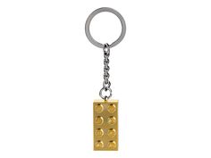 a lego keychain is shown with four small yellow bricks on it's side