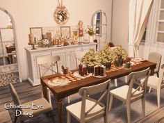 a dining room table set for christmas eve dinner