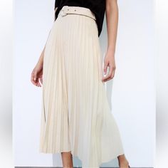 New With Tag Midi Skirt With A High Waist And Tonal Belt. Zip Closure. Outer Shell 100% Polyester Ecru | 3046/031 1058 White Skirt For Fall Day Out, White Fall Day Out Skirt, Chic White Pleated Skirt For Fall, Chic Long Cream Skirt, Chic White Flowy Skirt, Elegant White Belted Skirt, White High-waisted Pleated Skirt For Spring, Spring High-waisted Cream Skirt, Chic High-waist Pleated Skirt For Summer