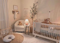 a baby's room is decorated in neutral colors