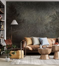 a living room filled with furniture next to a bookshelf and a lamp on top of a table