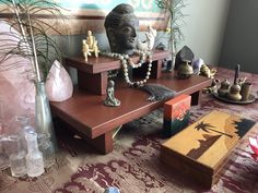 a wooden table topped with lots of different items