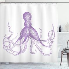 an octopus shower curtain in a bathroom