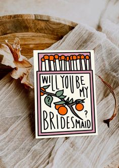 a card that says, will you be my bridesmaid? with oranges on it