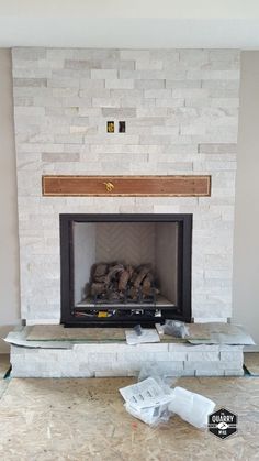 the fireplace is being remodeled and ready to be used as a living room decoration piece