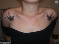 a woman with two birds on her chest