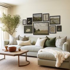 a living room filled with lots of furniture and pictures on the wall above it's couch