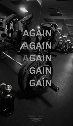 the gym is full of weight machines and dumbbells with words that read, again again again again again again again again again again again again again