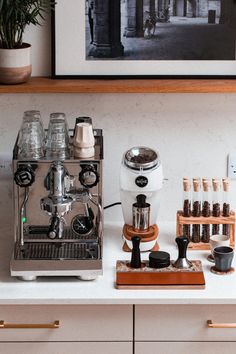 an espresso machine sitting on top of a counter