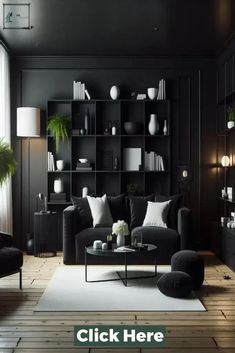 a living room with black walls and furniture