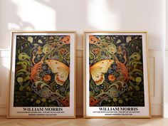 two framed art prints on the wall next to each other, one with an orange butterfly