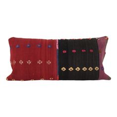 two pillows with different colors and designs on the sides, one is red, one is black