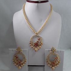 Absolutely stunning gold plated large size light weight pendant set with matching chand bali earrings.  Perfect for wedding party or any other occasion. Perfect gift for your loved ones or yourself.  Item will come as picture shown. Gold finish and handcrafted. 6ct gold plated polki jewellery set Mala haar necklace: 42cm Pendant Size: L x 5.5cm / W x 5cm Earrings Size: L x 7cm / Width: 5cm Pearl colour: Gold CZ stone colour: Coral red & clear white Necklace Closer: Hook Note: manual measurement, Traditional Hyderabadi Jewellery, Jadau Jewellery Traditional, Arabic Accessories, Chand Bali Earrings, Hyderabadi Jewelry, Chand Bali, Jadau Jewellery, Islamic Jewelry, Wedding Necklace Set