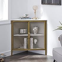 a living room with a chair and a cabinet in the corner that has books on it