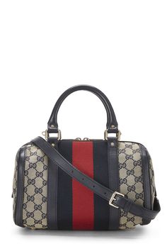 Find GUCCI Small Original Gg Canvas Web Boston Bag on Editorialist. The Gucci GG Canvas Web Boston Bag is crafted from GG monogram canvas with a black, red and blue web stripe detail. It features a top handle, an adjustable shoulder strap, and a zipper closure. This small bag is perfect for carrying your essentials. Cow Boy, Love Blue, Boston Bag, Strap Top, Strap Tops, Vuitton Bag, Diaper Backpack, Thom Browne, Baby Bag