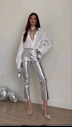 Purple And Silver Outfit Ideas, Metallic Outfits Women, Silver Winter Outfit, How To Style Silver Sequin Pants, Sparkling Pants Outfit, How To Style Silver Pants, Silver White Outfit, Silver Pants Outfit Night, Metallic Silver Outfit