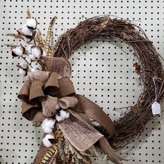 a wreath made out of burlock and cotton