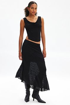 Semi-sheer lace Silence + Noise midi skirt in a body-skimming, a-line silhouette. Features a low-rise waistline that sits at the hips, tiers down the skirt and a slanted asymmetrical hem. Features Silence + Noise Serene asymmetric lace midi skirt Low rise midi skirt Stretch semi-sheer lace Low rise waistline Tiered skirt Slanted asymmetrical hem Slim a-line fit Midi length Partially lined Easy pull-on style UO exclusive Content + Care 97% Nylon, 3% spandex Machine wash Imported Size + Fit Model in Black is 5’11" and wearing size Small Measurements taken from size Small Length: 35.5" | Silence + Noise Serene Asymmetric Lace Midi Skirt in Black, Women's at Urban Outfitters Low Rise Midi Skirt, Lace Midi Skirt, Lace Midi, Tier Skirt, Tiered Skirt, Asymmetrical Hem, Staple Pieces, Black Fits, Sheer Lace