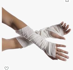 a pair of hands with bandages on them