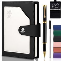 a note book, pen and clipboard with four different colors