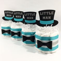 four little man hats with bow ties on them