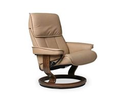 the reclining chair is shown in beige leather