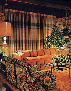 the living room is decorated in orange and green