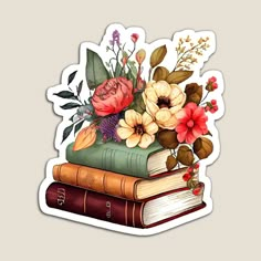 a sticker with flowers and books on it's side, sitting on top of each other