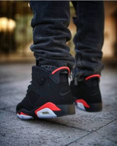 The 2019 edition of the Air Jordan 6 Retro ‘Infrared’ is true to the original colorway . which Michael Jordan wore when he captured his first NBA title. Dressed primarily in black nubuck with a reflective 3M layer underneath . the mid-top features Infrared accents on the midsole . heel tab and lace lock. Nike Air branding adorns the heel and sockliner . an OG detail last seen on the 2000 retro. Mens Shoes Jordans, Estilo Cholo, Vanessa Jackman, Air Jordan 6 Retro, Nike Air Jordan 6, Jordan 6 Retro, Jordan Shoes Retro, Shoes Sneakers Jordans, Nike Shoes Jordans