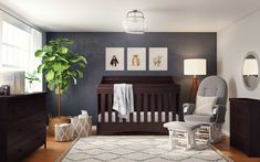 a baby's room with a crib, rocking chair and large potted plant