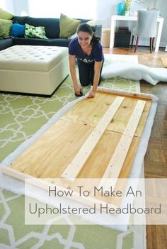 a woman laying on top of a wooden floor in front of a couch with the words how to make an upholstered headboard