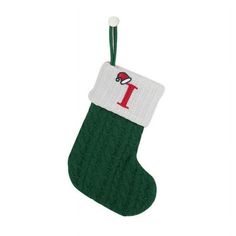 a green christmas stocking with santa's hat on it and the number one