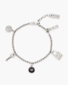 A charm bracelet celebrating Marc’s love of trims. Designed to underscore the luxury of everyday items, this covetable wrist adornment features craft-inspired charms and a length-adjustable chain for a personalized fit. | MARC JACOBS Button Charm Bracelet in Silver/Black Marc Jacobs Jewelry, Bracelet In Silver, Everyday Items, Marc Jacobs, Charm Bracelet, Charms, Bracelet, Chain, Silver