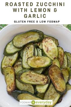 roasted zucchini with lemon and garlic in a white bowl