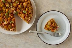 a piece of pie on a plate with a fork next to it and another slice missing