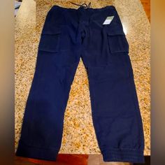 New With Tags. Men's Size L. Slim Hip, Thigh, And Leg. Stretch For Comfort. Elastic Waist With Drawl String. Elastic At Ankle. Cargo Jogger Pants, Slim Hips, Cargo Joggers, Jogger Pants, Mens Pants, Elastic Waist, Man Shop, Elastic, Tags