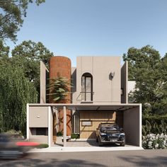 a car is parked in front of a modern house with trees and bushes around it