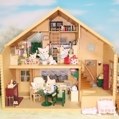 a doll house with all the furniture and accessories