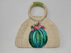 I love Mexico celebrates the native crafts of Mexico and the artists that produce them, enabling them and their communities to get recognized for their talented work and achieve economic stability for their families. This listing is for this bag shown on the picture, made of palm leaves and 100% natural materials. The tassels or other accessories on the picture are not included. The cactus paint is 100% made by hand. Measurements : please see pictures for exact size. All size units are in inches Green Handheld Beach Bag, Handheld Green Beach Bag, Green Summer Beach Bag With Handles, Summer Green Handheld Straw Bag, Handmade Green Crochet Bag For Beach Season, Summer Shoulder Bag Gift, Bohemian Style Spring Tote Straw Bag, Bohemian Natural Beach Bag For Summer, Green Handwoven Beach Bag For Summer