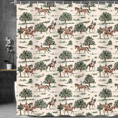 a shower curtain with horses and trees on it