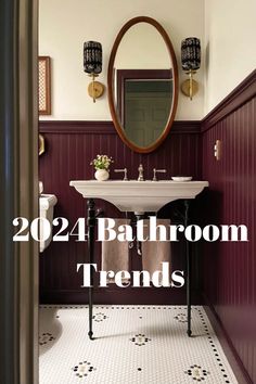 the bathroom is decorated in burgundy and white