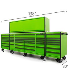 a large green tool cabinet sitting on top of a white floor