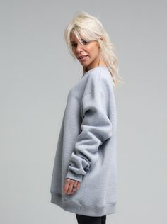 Elevate your casual wardrobe with the chic simplicity of our Relaxed Fit Viscose Sweatshirt. Crafted from luxuriously soft and sustainable viscose fabric, this sweatshirt offers an eco-friendly option that does not compromise on style or comfort. Designed for the modern woman on the go, the light heather grey hue complements a wide array of looks, seamlessly transitioning from your morning run to a casual coffee date.. FEATURES:A relaxed, oversized silhouette for a modern and effortless style. The drop shoulder design adds a laid-back charm, while the ribbed cuffs provide structure to the loose form.100% Handmade. SIZE & FIT: Fit: A relaxed fit with room to moveModel is wearing size Small or S/M View our SIZE CHART before ordering MATERIALS & CARE: Content: 65% Cotton, 35% Polyester Care: Versatile Stretch Cotton Sweater, Relaxed Fit Sweatshirt With Elastic Cuffs For Loungewear, Relaxed Long Sleeve Sweatshirt For Fall, Oversized Sweater With Ribbed Waistband For Fall, Relaxed Long Sleeve Fall Sweatshirt, Athleisure Long Sleeve Sweater With Ribbed Waistband, Sporty Tops With Elastic Cuffs For Loungewear, Fall Sweater With Ribbed Waistband And Relaxed Fit, Relaxed Fit Long Sleeve Sweatshirt With Elastic Cuffs