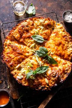 a pizza sitting on top of a metal rack