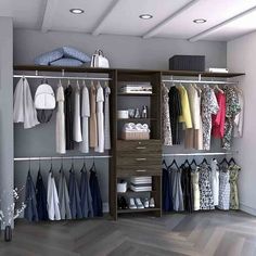 an organized closet with clothes, shoes and other items on it's shelves for storage