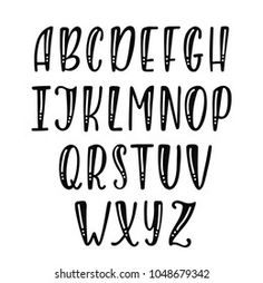 handwritten alphabet with black ink on white background