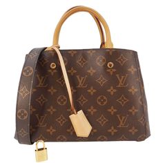 Item Details: The Louis Vuitton Montaigne Bb Shoulder Bag In Brown Monogram Canvas Features A Compact, Structured Silhouette. Its Elegant Top Handles, Detachable Strap, And Gold-Tone Hardware Make It A Versatile And Sophisticated Accessory For Any Occasion. Series: Montaigne Bb Style: Shoulder Bag Color: Brown Material: Monogram Canvas Made: Spain Date Code: Ca2125 Made Year: 2015 Measurements: W 11" H 8" D 4" Accessories: Clochette, Shoulder Strap, And Padlock With Keys. Sku: Dd20780 Condition Louis Vuitton Montaigne, Bb Monogram, Bb Style, Shoulder Bag Brown, Bags Louis Vuitton, Canvas Shoulder Bag, Louis Vuitton Bags, Monogram Canvas, Brown Color