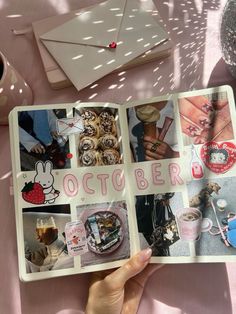 a person holding an open book with pictures and words on the pages that say october