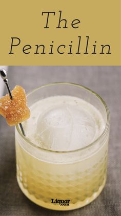 the penguinin cocktail is served in a glass with a toothpick sticking out of it