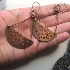 Made By Me In My Home Studio. Large Half Circles Of Textured Copper Swing Freely In These Trapeze Style Earring. Made From Recycled Roofing Copper That Is Pierced And Textured, Antiqued With Liver Of Sulfur And Sealed With Jewelers Wax. The Earrings Are Finished With Handmade Sterling Silver Ear Wires. Artisan Copper Earrings For Everyday, Artisan Copper Earrings For Everyday Wear, Brown Electroformed Brass Earrings, Handmade Rust-colored Earthy Earrings, Etched Copper Jewelry, Rivet Jewelry, Etched Copper, Seed Bead Earrings, Copper Earrings